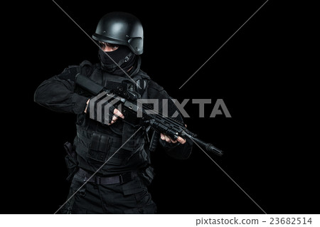 Three soldiers in full uniform with guns is going Three soldiers in full uniform with guns is going 23682514