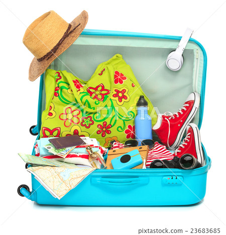 The open blue suitcase, sneakers, clothing, hat The open blue suitcase, sneakers, clothing, hat 23683685