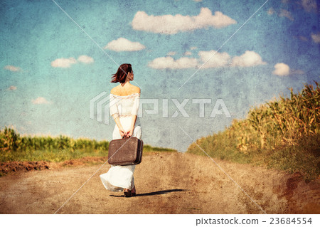 young woman with suitcase 23684554