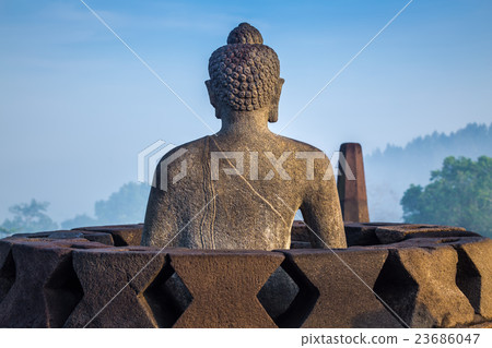 Buddha statue at Borobudur temple, Java, Indonesia Buddha statue at Borobudur temple, Java, Indonesia 23686047