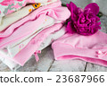 Pink layette for a newborn baby girl with peone 23687966