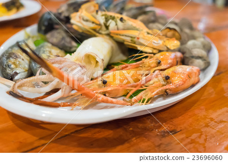 Seafood on white dish, Seafood on white dish, 23696060