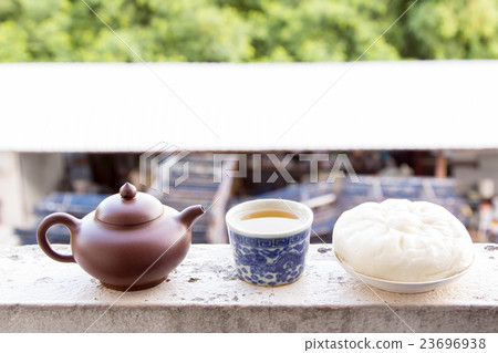 Chinese teapot Chinese tea and dumplings streamed. Chinese teapot Chinese tea and dumplings streamed. 23696938