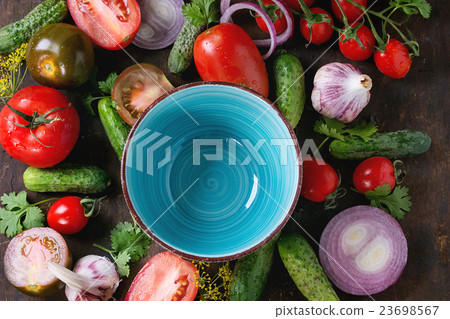 Background with tomatoes and cucumbers Background with tomatoes and cucumbers 23698567