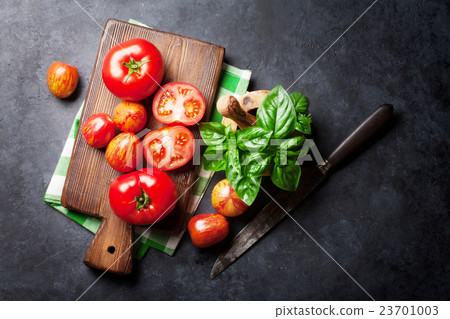 Fresh ripe garden tomatoes and basil 23701003