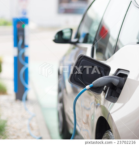 Electric Car in Charging Station. 23702216