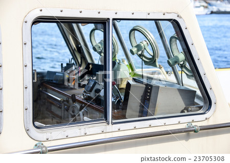 Steering room of small boat Steering room of small boat 23705308