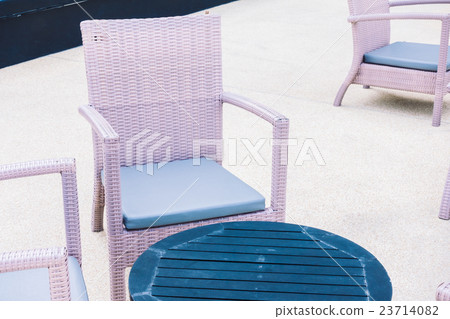 Empty table and chair 23714082