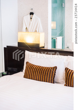 Pillow on bed 23714414