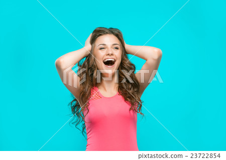 The young woman's portrait with happy emotions 23722854