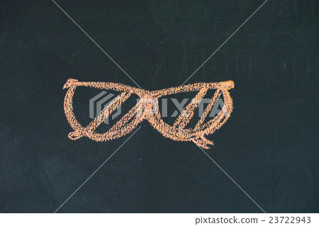 Chalk cartoon drawn on black black board Chalk cartoon drawn on black black board 23722943