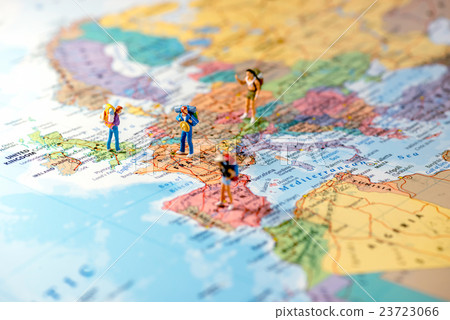 Miniature friends planning euro trip. Macro photo 23723066