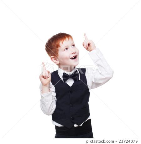 Redhead boy in vest with bow tie, happy and 23724079
