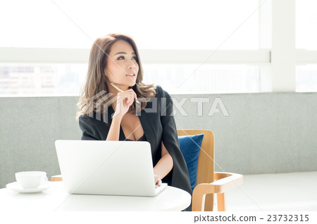 business women pondering over ideas business women pondering over ideas 23732315