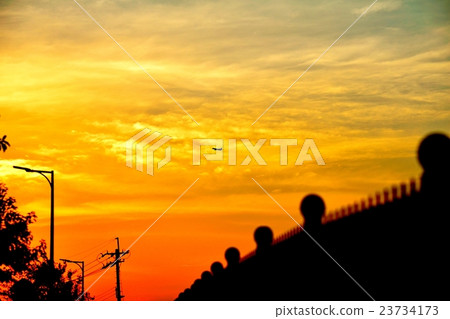 Sunset sky and plane 23734173