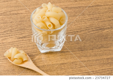Elbow Macaroni or Gomiti Pasta on Table  23734727
