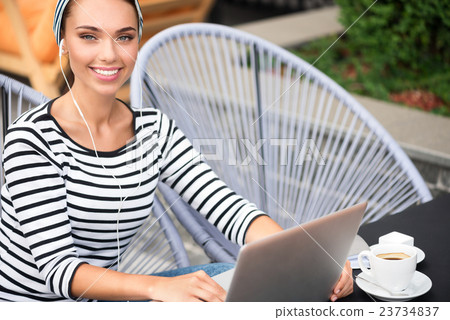 Positive woman resting in the cafe Positive woman resting in the cafe 23734837