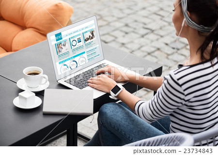 Nice young woman using laptop Nice young woman using laptop 23734843
