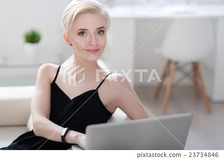 Gorgeous woman working on laptop Gorgeous woman working on laptop 23734846