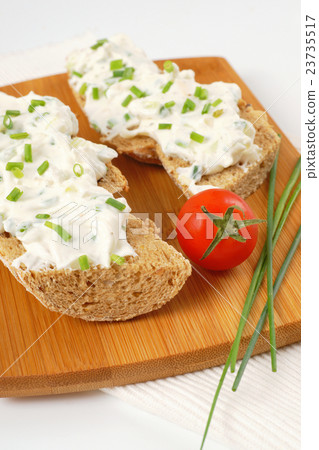 bread roll with cheese spread bread roll with cheese spread 23735517