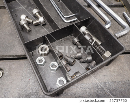 Nut and screw in the black box. Nut and screw in the black box. 23737760