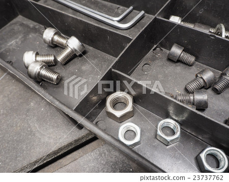 Nut and screw in the black box. Nut and screw in the black box. 23737762