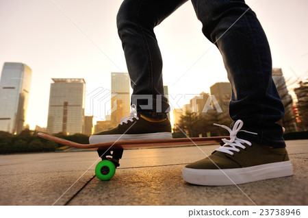 skateboarder legs skateboarding at sunrise city skateboarder legs skateboarding at sunrise city 23738946