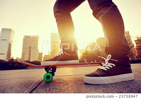 skateboarder legs skateboarding at sunrise city skateboarder legs skateboarding at sunrise city 23738947