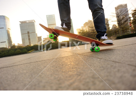 skateboarder legs skateboarding at sunrise city skateboarder legs skateboarding at sunrise city 23738948