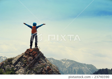 cheeringwoman backpacker open arms mountain peak cheeringwoman backpacker open arms mountain peak 23740390