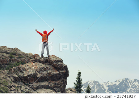 cheeringwoman backpacker open arms on mountain cheeringwoman backpacker open arms on mountain 23741927