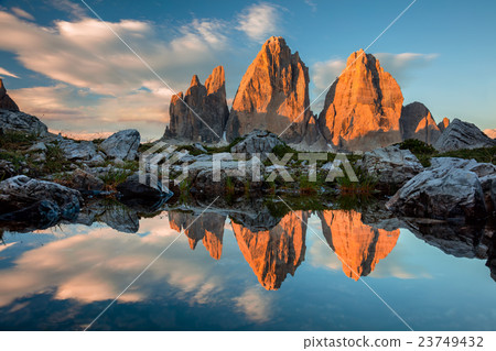 Tre Cime di Lavaredo with reflection in lake  23749432