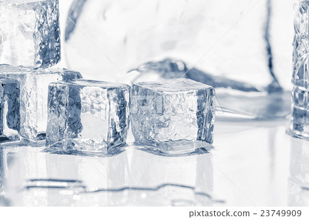 Ice cubes on the table 23749909