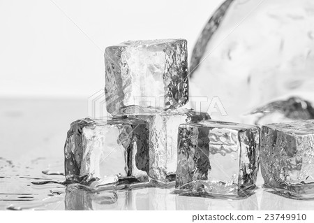 Ice cubes on the table 23749910