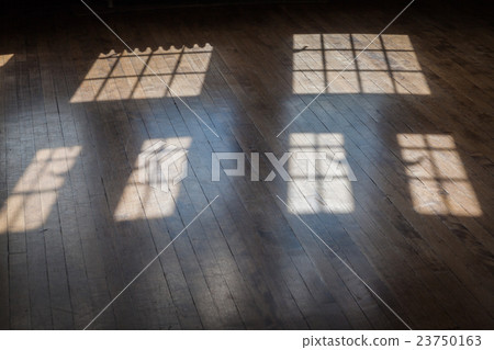 light from windows on an old wood floor light from windows on an old wood floor 23750163
