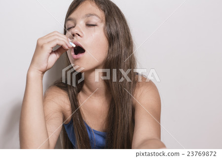 Depressed teenager with pills Depressed teenager with pills 23769872