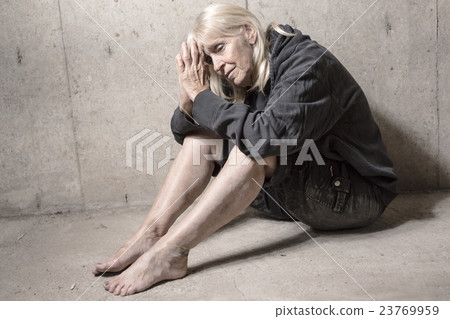 depress senior person with concrete background depress senior person with concrete background 23769959