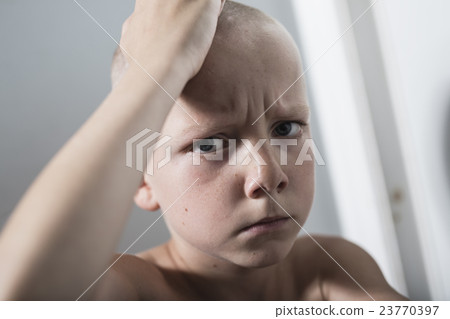 Neglected lonely child leaning at the wall 23770397