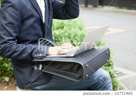 A man who mails outdoors 23772465