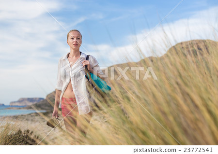 Free Happy Woman Enjoying Sun on Vacations. 23772541