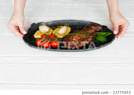 Steak with vegetables meal serving, copyspace Steak with vegetables meal serving, copyspace 23775953