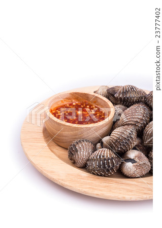 Boiled blood cockle with sauce isolated on white background 23777402