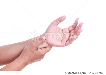 Close up woman's hand holding her wrist isolated on white . Wrist pain concept. Close up woman's hand holding her wrist isolated on white . Wrist pain concept. 23778782