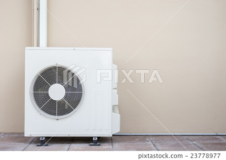 Air conditioning compressor near the wall Air conditioning compressor near the wall 23778977