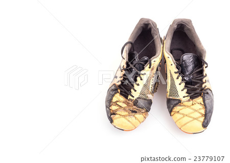 Old football shoes isolated on white 23779107