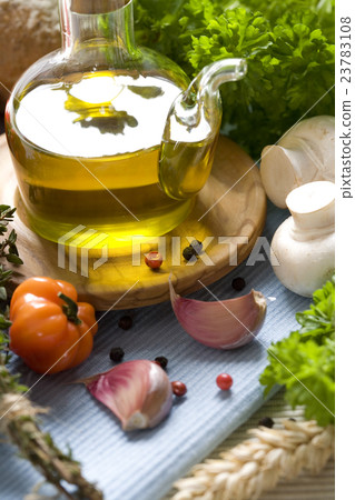 Bottle of Olive oil and condiments 23783108