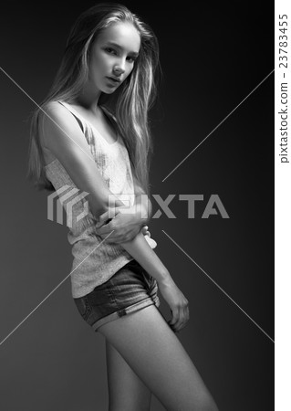fashion model is posing in studio for  test photo shoot showing different poses 23783455