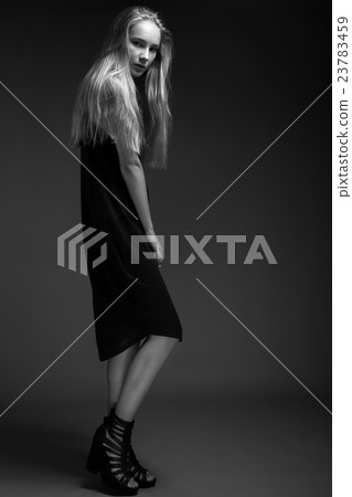 fashion model is posing in studio for test photo shoot showing different poses fashion model is posing in studio for test photo shoot showing different poses 23783459