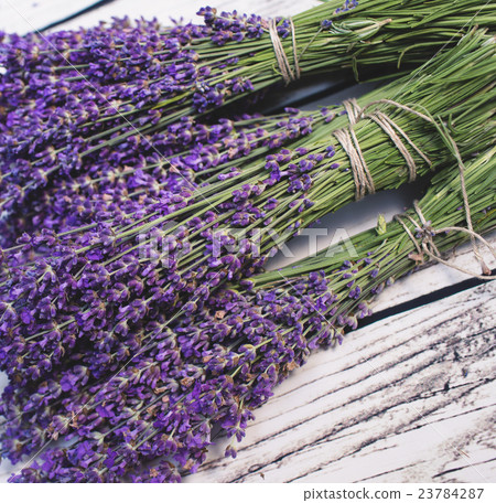 Lavender bunch on wood background Lavender bunch on wood background 23784287
