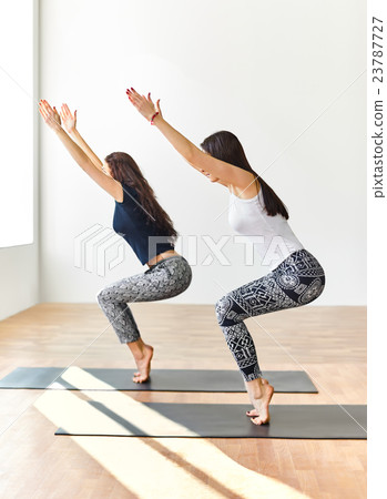 womens doing yoga asana supported headstand womens doing yoga asana supported headstand 23787727